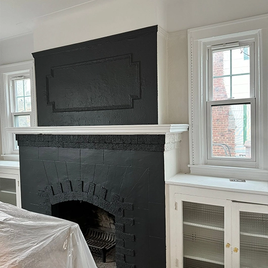 Bright hallway showcasing smooth interior wall paint and crisp trim lines.